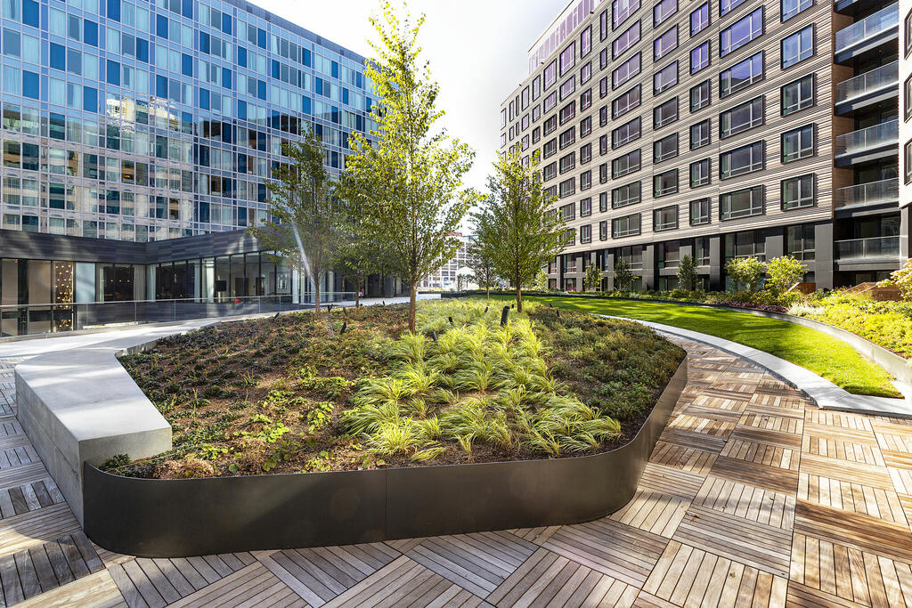 Seaport Parcel K Hotel with wood tile paver amenity deck and green roof in Boston, Massachusetts